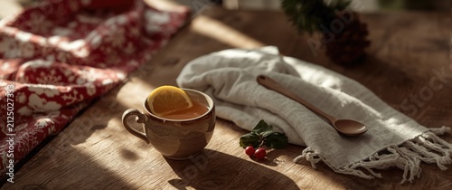 Cup of Hot Beverage with Lemon Slice on Wooden Table in Warm Natural Light