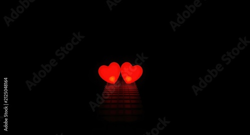 Glowing Red Heart Symbols Together on a Black Background