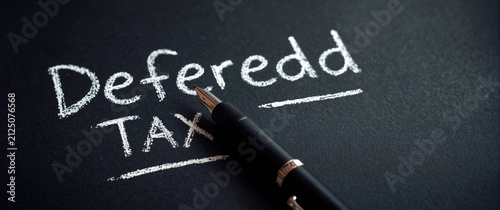Writing Deferred Tax on a Chalkboard with a Black Pen