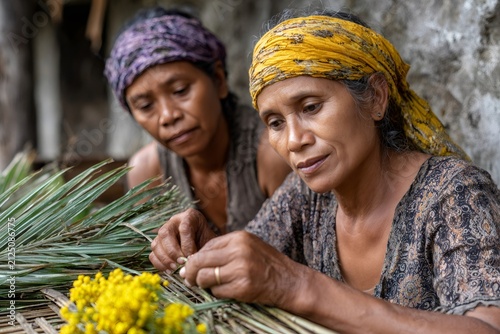 Women weaving traditional craft with natural materials