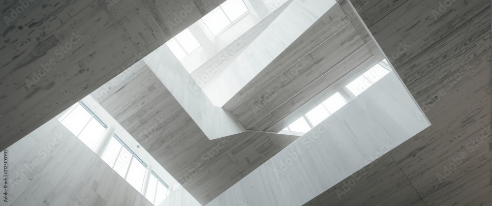 Fototapeta premium Modern Architectural Staircase with Natural Light Filtering Through Windows