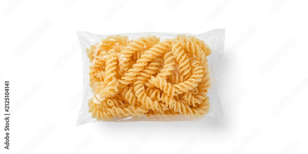 Fototapeta premium Pasta Fusilli in Clear Plastic Packaging on White Background