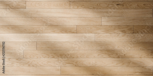 Top View of Light Oak Wood Planks Flooring with Soft Window Shadow Background