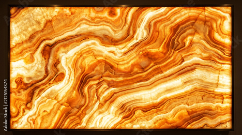 Backlit Golden Onyx Marble Slab with Natural Veined Texture