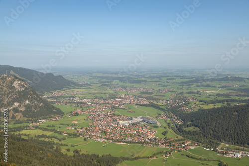 Panoramic view of a rural town in an alpine valley