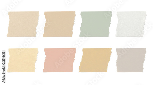 Collection of torn colored paper swatches on white