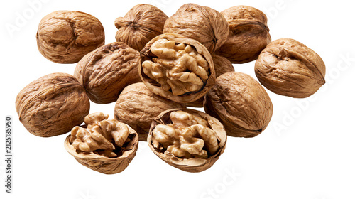Pile of whole and cracked walnuts with kernels exposed, isolated on transparent background