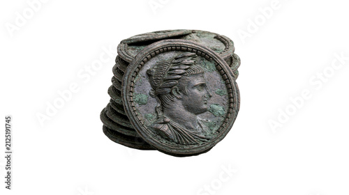 Obraz na płótnie Stack of ancient Roman bronze coins with profile portrait of emperor, isolated o