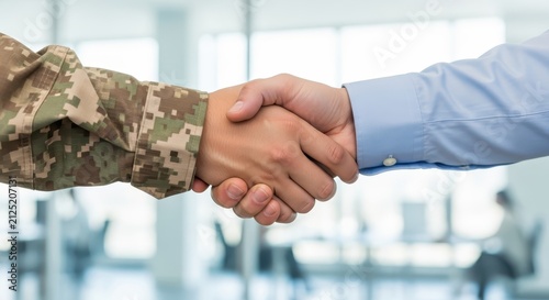 Handshake Between Military Soldier in Camouflage Uniform and Businessman in Office Setting Representing Cooperation
