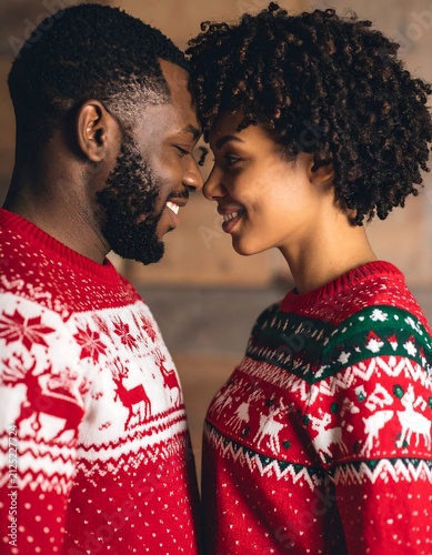 Two women in traditional attire embracing warmly.