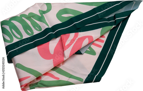 The square scarf stands out with pink and green printed patterns on a light-colored background.