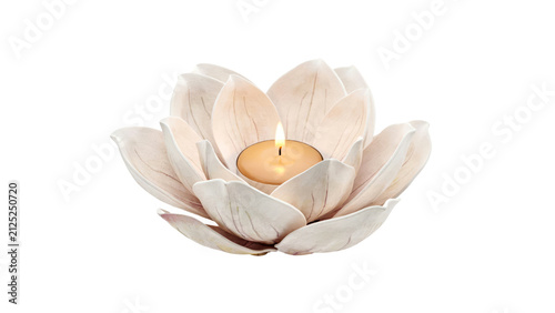 Beautiful white ceramic lotus flower shaped candle holder with a glowing warm tea light flame captured in soft studio lighting isolated on transparent background