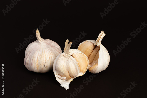 Fresh Garlic Bulbs Isolated on Black Background
