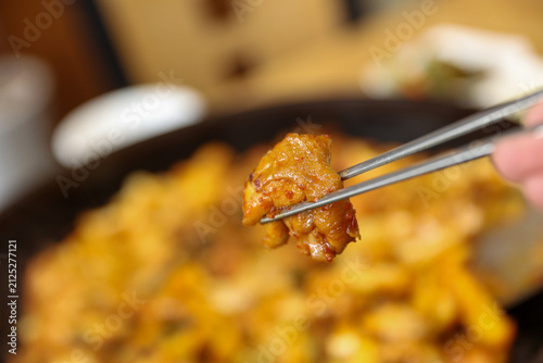 Spicy Korean Chicken Stir Fry Dakgalbi with Vegetables on Iron Pan