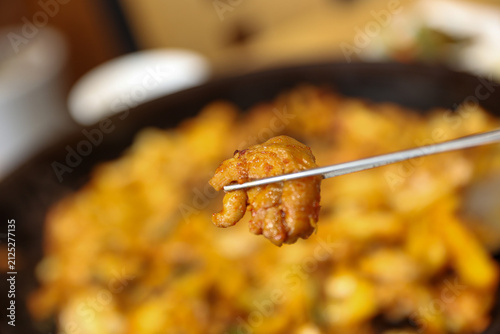 Spicy Korean Chicken Stir Fry Dakgalbi with Vegetables on Iron Pan