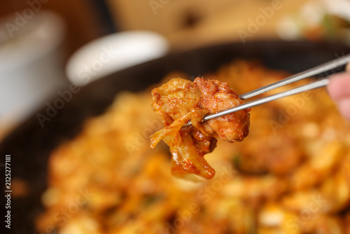Spicy Korean Chicken Stir Fry Dakgalbi with Vegetables on Iron Pan