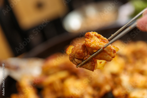 Spicy Korean Chicken Stir Fry Dakgalbi with Vegetables on Iron Pan