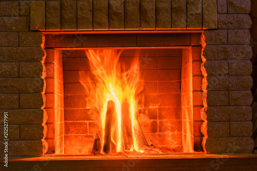 Cozy fireplace,winter vacations, fire burning