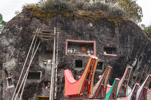 Quadro su tela Ancient rock burial site of Lo'ko Mata showcasing Toraja cultural heritage in No