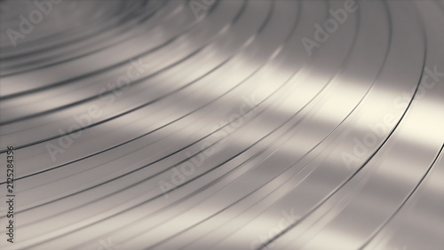 Reflective curved layers of clear glass creating smooth light patterns on a bright surface, abstract background