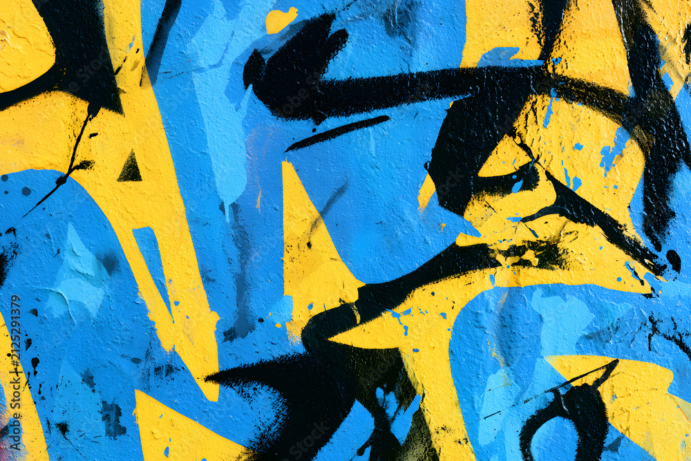Naklejka premium Urban graffiti wall in blue, yellow, and black colors, 90s, Y2K style, street art, grungy texture. Posters, digital art, social media, modern 90s, 2000s, Y2K creative banner, summer visuals.