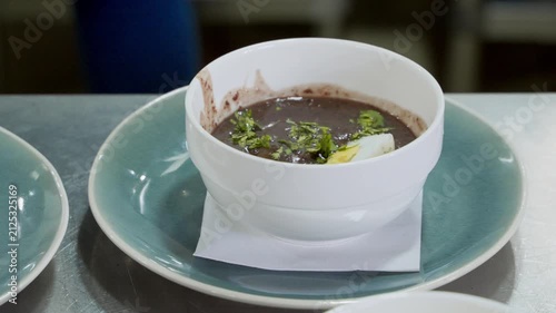 Traditional brazilian feijoada soup in restaurant kitchen