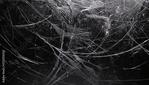 glass pane texture with dirt particles and white marks against a deep dark backdrop