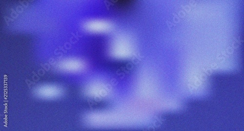 Fotografie Soft purple and blue abstract blurred light shapes with a fine grain creating a
