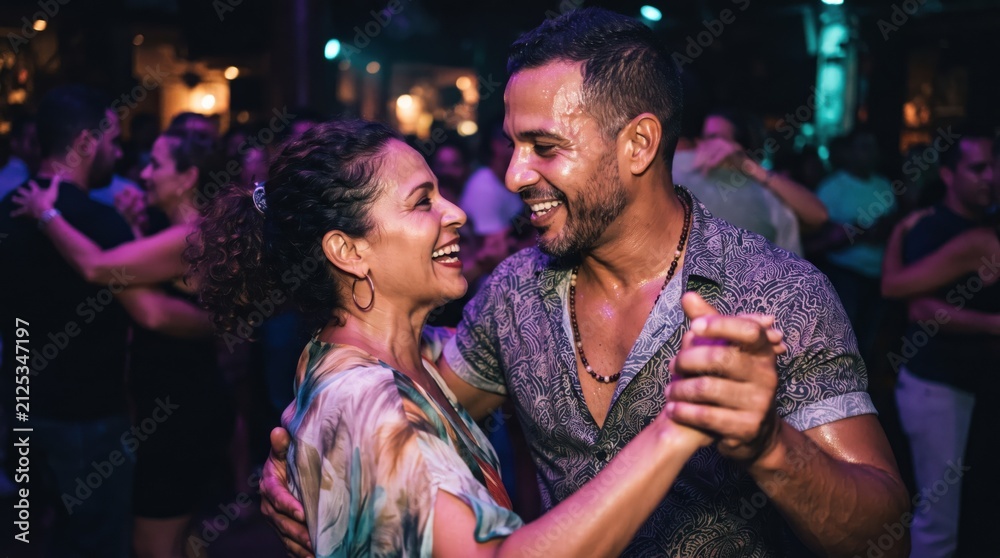 Obraz premium Man and woman dancing salsa in a crowded nightclub. Joyful couple enjoying social dance at a party. Latin music event and lifestyle night out with music and rhythm concept.