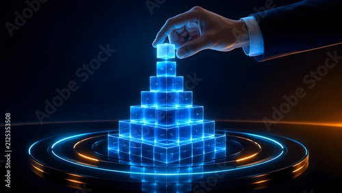 Hand placing a glowing digital cube onto a stacked pyramid structure, representing strategic growth, innovative technology, and future business development in the digital era.
