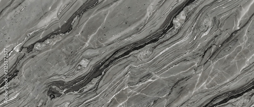 фотографія Marble texture background showing grey and black striated stone surface with lay