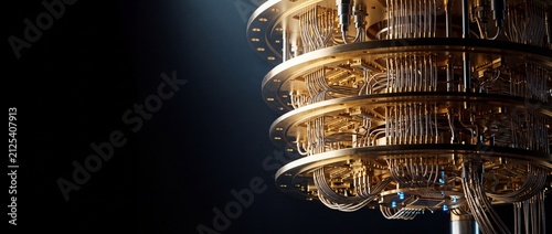 Quantum computer processor with complex wiring and golden components against a dark, dramatic background.