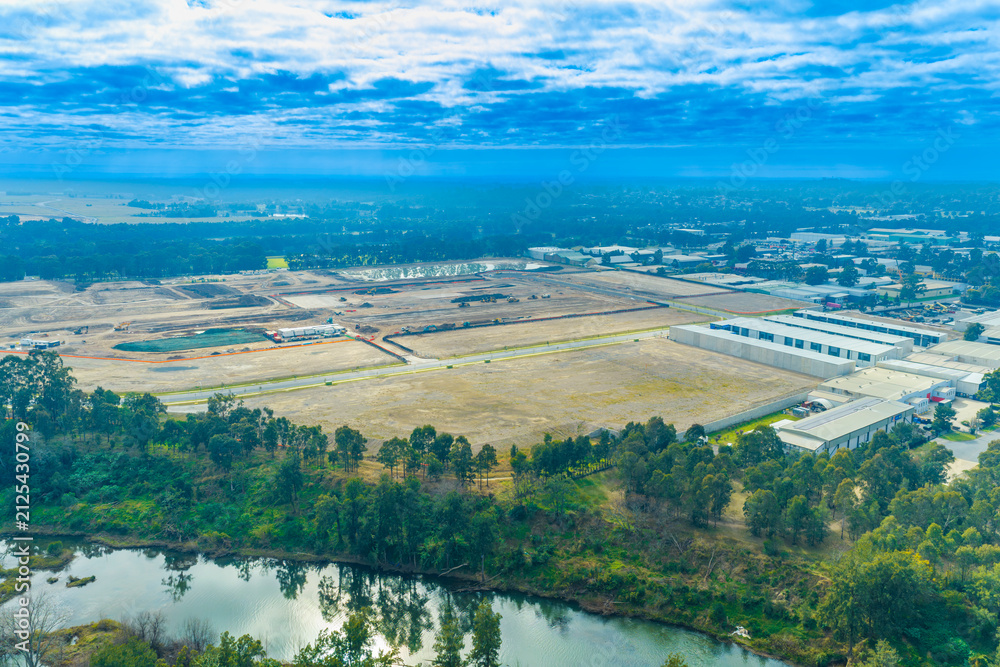 Obraz premium Drone aerial photograph of a large industrial construction site in The Nepean Business Park precinct in the Greater Western Sydney town of Penrith in New South Wales, Australia