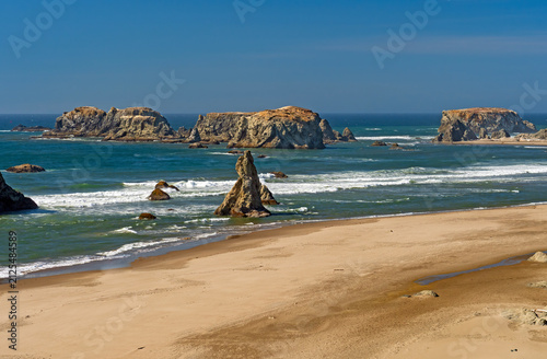 Coastal Rocks and Crashing Waves on a Idyllic Beach