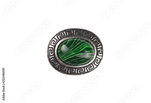Obraz na plátně Vintage silver brooch with a green stone isolated on white background