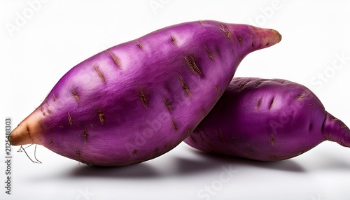 two vibrant whole purple yams also known as ube or purple sweet potatoes isolated against a clean white background