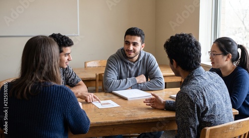 International students learning together in language classroom
