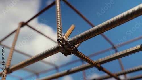 Bild auf Leinwand Steel rebar cage forming a strong structural reinforcement for concrete, prepari
