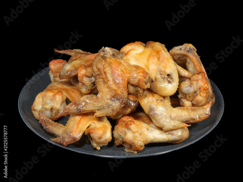 Roasted Chicken Wings on Black Background