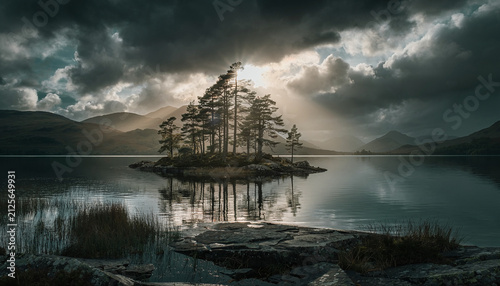 Serene Lake Landscape with Dramatic Sky and Majestic Mountains: A Perfect Blend of Nature's Beauty and Tranquility
