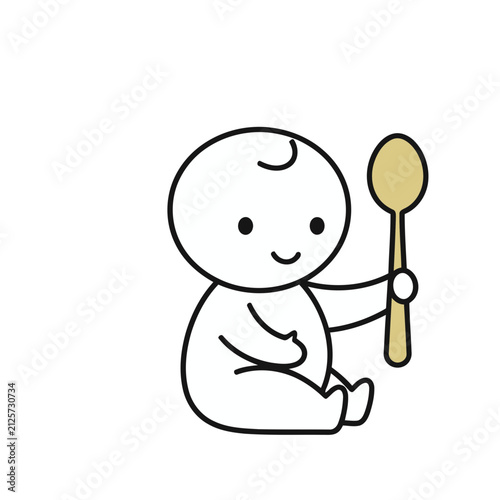 Baby holding a spoon
