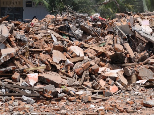 Pile of broken bricks and concrete debris at a construction demolition site