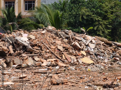 Pile of construction debris and broken bricks at a demolition site