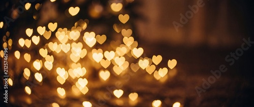 Golden Heart Shaped Bokeh Light Background