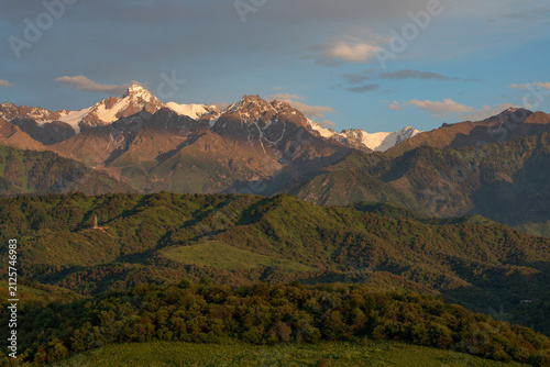 The picturesque mountain range of the Trans-Ili Alatau near the Kazakh city of Almaty on a summer evening.