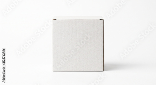 Plain white cardboard box packaging isolated on a white background with copy space for product branding or shipping designs vertical