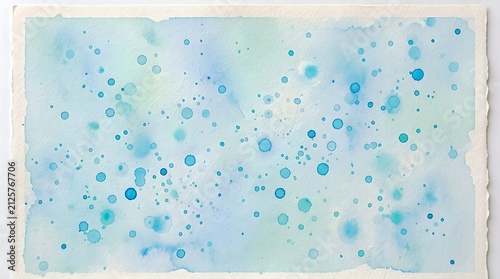 Abstract watercolor background with blue and teal paint splatters and drops on textured paper
