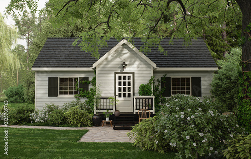 Cozy white cottage house surrounded by lush green forest garden