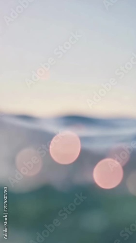 A Serene Journey Through the Fluid Symphony of Ocean Waves, Capturing the Effervescent Beauty of Light Reflections and Colors in the Water’s Embrace