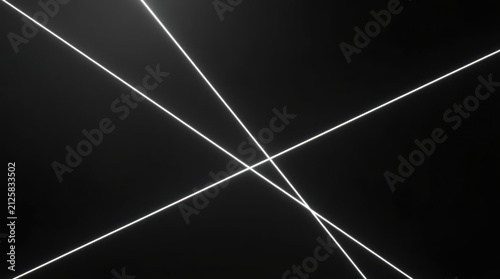 Thin white laser streaks crossing on black background creating minimal geometric lines